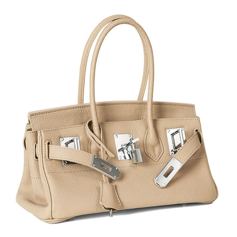 minimalist leather handbag with lock top handle side angle
