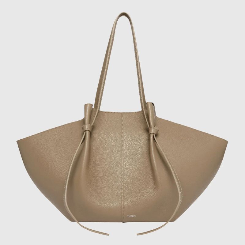 minimalist slouchy leather tote bag in beige with oversized shape