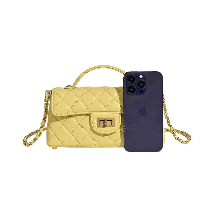 quilted lambskin crossbody bag size comparison with smartphone showing compact design