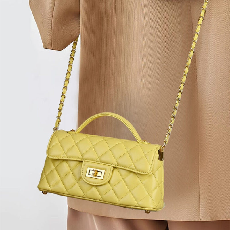 quilted lambskin crossbody bag worn as shoulder bag with gold chain strap