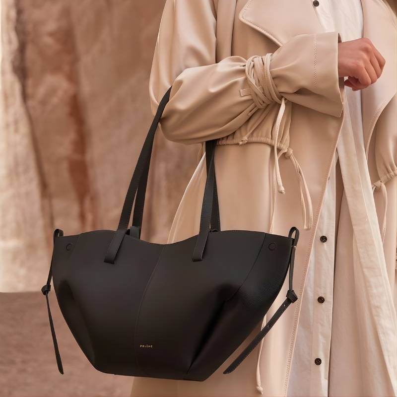 soft leather shoulder tote bag paired with everyday workwear