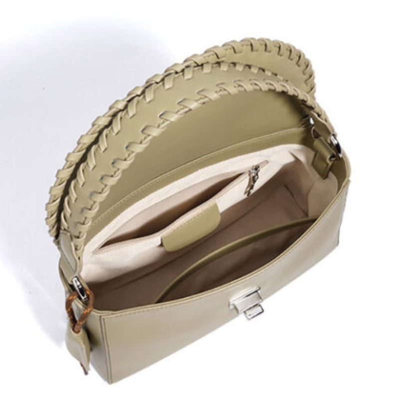 structured leather bag interior compartment with zipper braided handle design