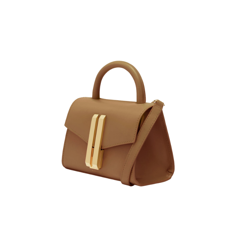 structured leather baguette bag side angle with top handle