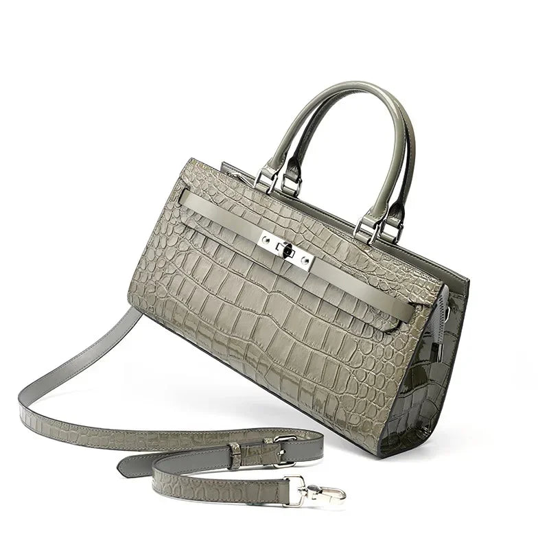 structured leather handbag angled view crocodile embossed texture crossbody strap