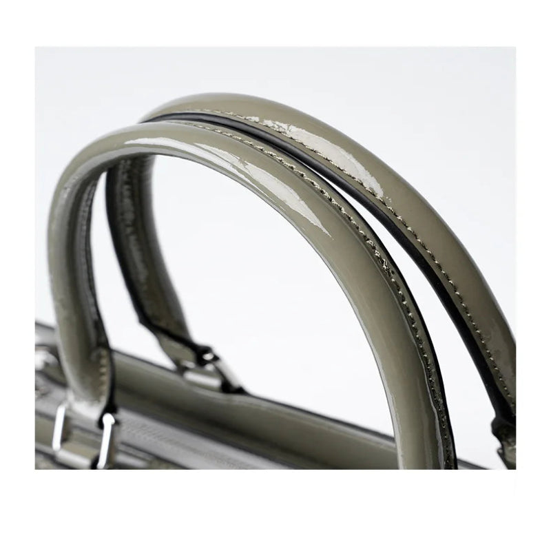 top handle detail structured leather handbag crocodile embossed leather texture